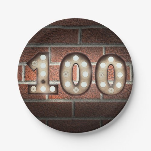 100th birthday marquee sign on brick wall paper plates