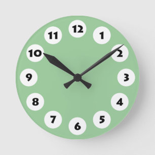 12 Spots - Black with White on Green 99CC99 Round Clock