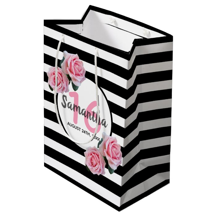 pink and white striped gift bags