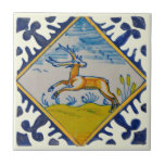 17th Century Delft Deer Handpainted Reproduction Ceramic Tile<br><div class="desc">From around 1650, this tile features a bold border and a diamond framed deer. Available in 4.5 and 6 inch tiles as well as other items. Be sure to see our other Delft tiles - they look great when combined as a variety of mix and match accent tiles on a...</div>