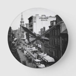 1859: Traffic and shops on Washington Street Round Clock