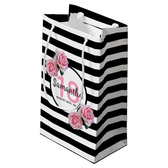 pink and white striped gift bags