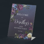 18th Birthday Moody Purple Flowers Custom Welcome Pedestal Sign<br><div class="desc">Moody and mysterious purple roses and peonies set the tone for this elegant 18th birthday welcome pedestal sign. White and blue flowers add a pop of color to the dark watercolor wreath. The white text really pops! Formal but with a modern twist for the woman who has always had a...</div>
