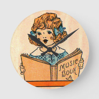 1920s little girl with music book round clock