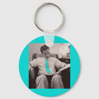 1930s reading the paper keychain