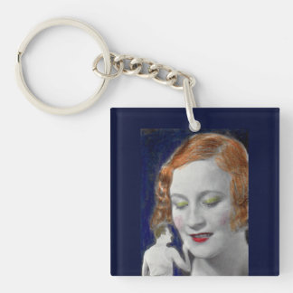 1930s redhead woman and her teeny tiny husband keychain