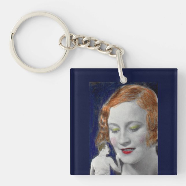 1930s redhead woman and her teeny tiny husband keychain (Front)