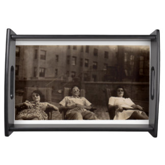 1940s three people relaxing on the roof serving tray