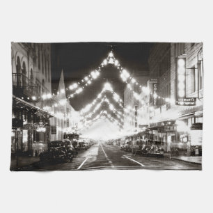 1942 Honolulu's Fort Street at Night Kitchen Towel