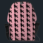 1950's Pink Poodle Messenger Bag<br><div class="desc">Break out your bobby socks and saddle shoes and start dancing! This 1950's Poodle Skirt Inspired Messenger Bag looks like a classic 1950s poodle skirt. The design features the repeating image of a black silhouette of a poodle on a pink background. It's beginning to look a lot like the 1950s!...</div>