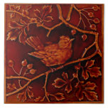 1 of 2 Repro Minton Birds Faux Relief Majolica Ceramic Tile<br><div class="desc">This is one of a pair of reproduction Victorian sculpted molded bird tiles in a rich majolica we'd describe as a cinnabar color. The original antique tiles were made by Minton China, one of the premier English tile producers of the late 19th and early 20th centuries. These Victorian tiles are...</div>