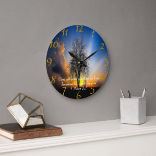 1 Peter 5:7 tree in a field with blue sky  Large Clock