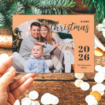 1 photo Christmas arch modern minimalist orange Holiday Card<br><div class="desc">This elegant and modern Christmas greeting card features a minimalist design displaying 1 of your favorite family pictures inside a trendy arch frame. Easily customizable with your family name and the current year in stylish serif fonts over a modern light orange shade background.</div>