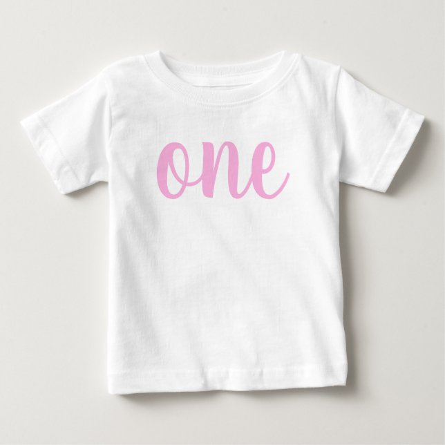 1st first birthday baby girl pink one cursive T-Shirt (Front)