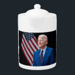 2021 Joe Biden US President Portrait Teapot<br><div class="desc">The photograph captures a moment in 2021 of President Joe Biden, image is now one of his official US Presidential photo. Sunlight streams through a window, casting a warm glow on the figure of an Biden standing confidently in the center of the frame. His arms are crossed, a gesture that...</div>