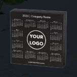2023 Calendar with Company Logo on Black Wooden Box Sign<br><div class="desc">Create your own professional 2023 calendar black wooden sign featuring your company logo, name, and business website. Replace the sample logo, name, and text with your own in the sidebar. (Changing the 2023 year text will NOT change the calendar.) Surrounding your logo is an easy to read white 2023 calendar...</div>