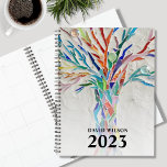 2023 Custom Name Planner<br><div class="desc">This unique Planner is decorated with a brightly colored tree. The original design was made in mosaic using tiny pieces of glass. Customize it with your name and year. To edit further use the Design Tool to change the font, font size, or color. Because we create our artwork you won't...</div>