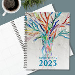 2023 Personalized Planner<br><div class="desc">This unique Planner is decorated with a brightly coloured mosaic tree on a pale gray background. Customize it with your name and year. To edit further use the Design Tool to change the font, font size, or color. Because we create our artwork you won't find this exact image from other...</div>