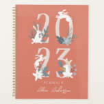 2023 Red Winter Floral & Foliage Bunny Planner<br><div class="desc">This cute 2023 planner features a white bunnies with winter floral and foliage on a red background. The reverse side features a burgundy background with botanical patterns. Personalize it for your needs.</div>