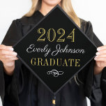 2024 Elegant Black and Gold Custom Graduation Cap Topper<br><div class="desc">Stylish graduation cap topper features your class of 2024 graduate's name in script with a scroll design accent. The classic black,  white,  and gold color scheme can be completely customized.</div>