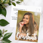 2024 Graduate Photo Chic Modern Script Overlay Postcard<br><div class="desc">Graduate is written in white handwritten script over your senior portrait photo makes a chic,  modern graduation announcement postcard. Customize with your name and high school or university class of 2024 under the bold typography and add your personal details on the back of these elegant text overlay graduate postcards.</div>