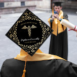 2024 Nursing School Graduation Cap Topper<br><div class="desc">Nursing graduation cap topper featuring a classic black background that can be changed to any color,  faux gold glitter floral pattern,  the medical symbol caduceus,  name,  school,  and class year.</div>