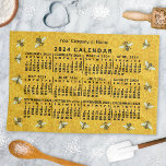 2024 Year Calendar Bee Honeycomb Apiary Custom Kitchen Towel<br><div class="desc">This 2024 year monthly calendar kitchen towel shows the days of the week in black. The design has a honeycomb / bee theme, and you can add a line of text to the top. This is a bold, pretty yearly calendar to help you conquer the new year. Always know what...</div>