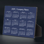 2025 Calendar Company Name Navy Blue Desktop Plaque<br><div class="desc">Stylish professional desktop calendar features a white 2025 calendar on a navy blue background. Add your company's name in the sidebar. (Changing the 2025 year text will NOT change the calendar.) If you'd like a different color background to match the color of your business brand, tap "Edit using Design Tool"...</div>