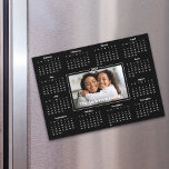 2025 Calendar Custom Photo Family Black Magnet<br><div class="desc">Create this usable keepsake for you family and friends so they will remember you year-round with this graphic, elegant 2025 calendar magnet card. Bold white typography, your custom photo and a simple, modern 12 month calendar overlay a dramatic black background. Personalize with the photo of your choice along with your...</div>