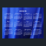 2025 Calendar on Blue Abstract Photo Template Poster<br><div class="desc">2025 calendar poster features the dates of the full year printed over a photograph of flowing blue silk. If you'd like a different background image, upload your own photo in the sidebar. Smooth folds of vibrant blue material create dark blue shadows and pale blue highlights. The abstract photo is a...</div>