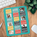 2025 Year Monthly Calendar Modern Photo Collage Mouse Pad<br><div class="desc">This personalized 2025 year monthly calendar mousepad has a mid-century modern geometric look with asymmetrical color blocks and cut-out paper style typography. Use the easy templates to add six of your favorite photos (horizontal work best, but all shapes will automatically adjust to fit the frames). This vibrant, ultra-mod calendar will...</div>