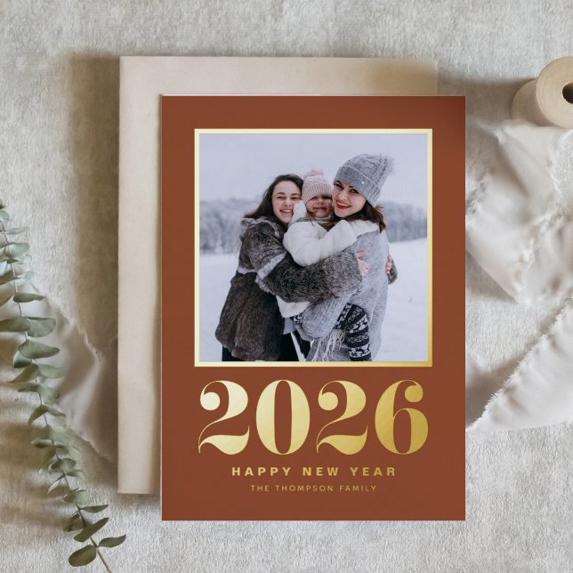 2026 Typography Terracotta Happy New Year Photo Foil Holiday Card (Welcome 2026 with this gold foil New Year photo card featuring a terracotta background.)