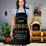 21st Birthday Born 2002 Black Gold Lady's Apron<br><div class="desc">A personalized classic black apron design for that birthday celebration. Add the name to this vintage retro style black, white and gold design for a custom birthday gift. Easily edit the name and year with the template provided. A wonderful custom birthday gift. More gifts and party supplies for that party...</div>
