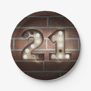 21st birthday marquee sign on brick wall paper plates