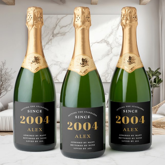 21st Birthday Name 2004 Black Gold Elegant Chic Sparkling Wine Label (Custom 21st birthday sparkling wine labels on 3 bottles in a modern room)