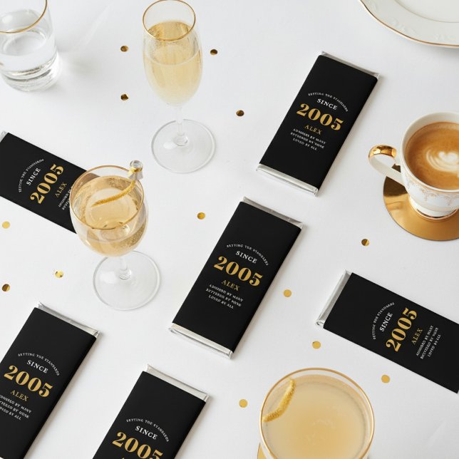 21st Birthday Name 2005 Black Gold Elegant Chic Hershey Bar Favors (2005 Candy bar laid out on a table.)