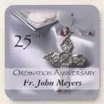 25th Ordination Anniversary Cross Host Drink Coaster<br><div class="desc">Celebrate a 25th Ordination Anniversary with this beautiful silver satin background and cross with red details. A paten of hosts is seen behind the name and 25th Year. Customize with the name for a truly personal Ordination Anniversary Gift! Party supplies and customizable items are available for a memorable celebration!</div>