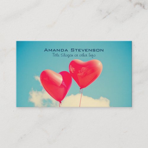 2 Bright Red Heart Shaped balloons Floating Upward Business Card