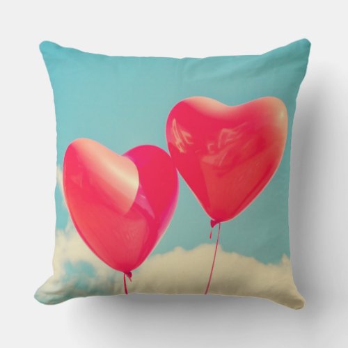 2 Bright Red Heart Shaped balloons Floating Upward Throw Pillow