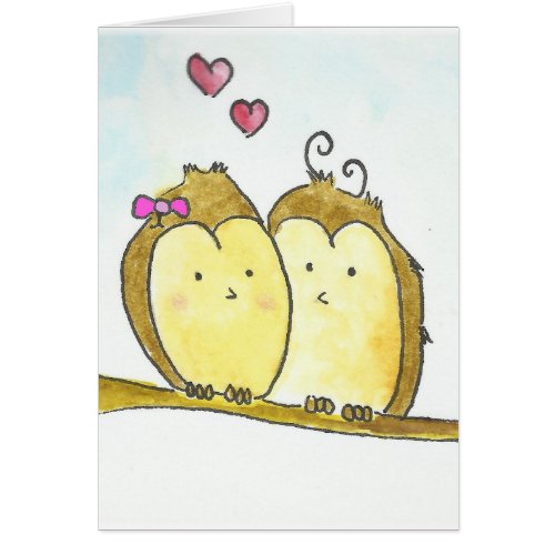 2 Brown Owls Cuddling Together