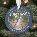 2 Photo 1st Christmas Engaged Navy Blue and White Ornament<br><div class="desc">Celebrate the joyful 1st holiday of your engagement with a custom 2 photo "Our First Christmas Engaged" round acrylic ornament. All text and images on this template are simple to personalize and can be different or the same on front and back. (IMAGE & TEXT DESIGN TIPS: 1) To adjust position...</div>