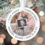 2 Photo 1st Xmas Expecting Baby New Parents Modern Ornament<br><div class="desc">Celebrate the precious gift of your newest family member with a stylish two photo round acrylic ornament. Gender neutral design is suitable for a new baby boy or girl. Wording and pictures on this template are simple to personalize, and can be different or the same on front and back. (IMAGE...</div>