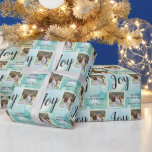 2 Photo Christmas Holiday Joy Wrapping Paper<br><div class="desc">This Christmas gift wrapping paper offers two square photo frames for your favorite family photos. The background is an elegant light teal blue accented with white snowflakes and the handwritten style text "Joy". Personalize this holiday gift wrap with your photos and name.</div>