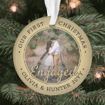 2 Photo First Christmas Engaged Black & Faux Gold Ornament<br><div class="desc">Celebrate the joyful 1st holiday of your engagement with a custom 2 photo "Our First Christmas Engaged" black and gold round acrylic ornament. All text and images on this template are simple to personalize and can be different or the same on front and back. (IMAGE & TEXT DESIGN TIPS: 1)...</div>