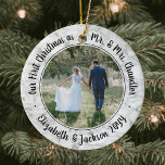 2 Photo Mr & Mrs 1st Christmas Script Faux Marble Ceramic Ornament<br><div class="desc">Celebrate a joyful 1st holiday as a married couple with a custom 2 photo "Our First Christmas as Mr. & Mrs." round ceramic ornament. All text and images on this template are simple to personalize and can be different or the same on front and back. (IMAGE & TEXT DESIGN TIPS:...</div>