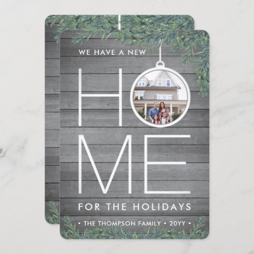 2 Photo New Home Address Modern Wood & Pine Moving Holiday Card - There's no place like a new home for the holidays! Share the joyful news of your new address as well as two of your favorite photos with an elegant holiday moving announcement card. Wording on this template is is simple to customize. (IMAGE PLACEMENT TIP: An easy way to center a photo exactly how you want is to crop it before uploading to the Zazzle website.) The modern farmhouse style design features rustic gray faux wood, festive watercolor pine greenery, modern minimalist ornament, simple typography name, and 2 pictures of your choice. Family and friends will love displaying this stylish personalized change of address card.