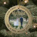 2 Photo Our First Christmas Married Black and Gold Ceramic Ornament<br><div class="desc">Celebrate a joyful 1st holiday as Mr. and Mrs. with a custom 2 photo "Our First Christmas Married" black and gold round ceramic ornament. All text and images on this template are simple to personalize and can be different or the same on front and back. (IMAGE & TEXT DESIGN TIPS:...</div>