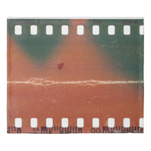 35mm filmstrip start, cool scratches. duvet cover