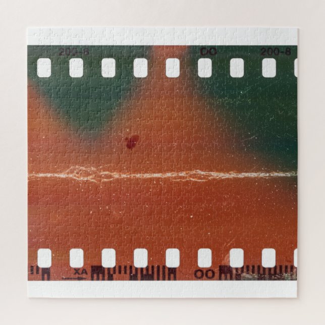 35mm filmstrip start, cool scratches. jigsaw puzzle (Vertical)