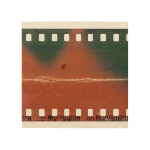 35mm filmstrip start, cool scratches. wood wall art
